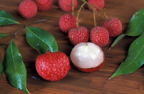 Lychees Whole and Peeled With Leaves